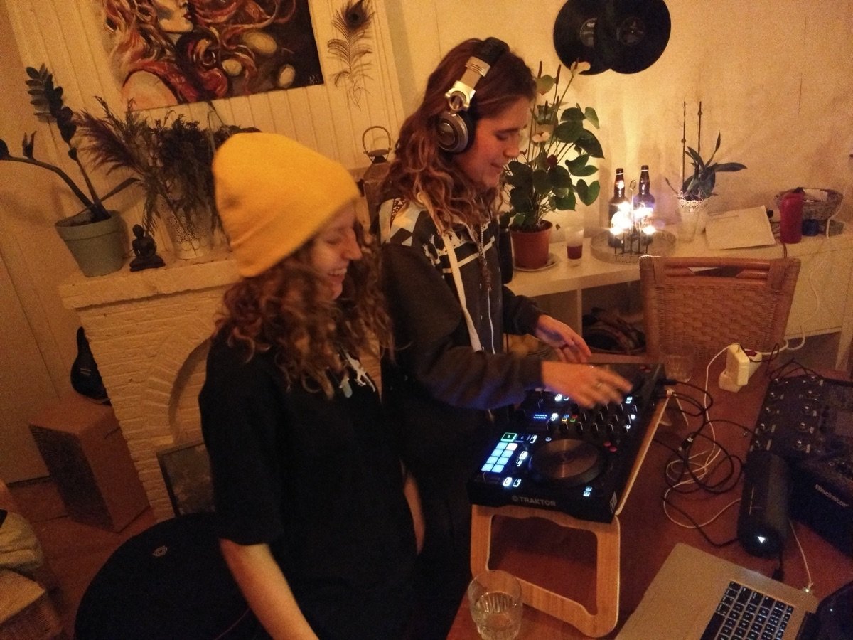 Two students learning to DJ together in Amsterdam